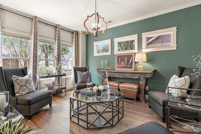 998 E Shadow Creek Ln, Eagle, ID 83616 - sitting room with a chandelier, wood finished floors, and ornamental molding