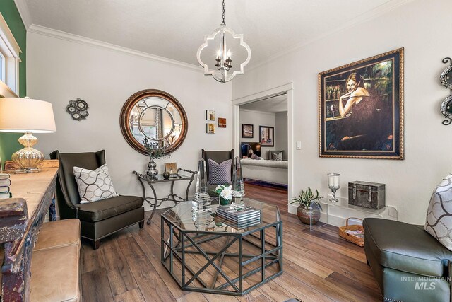 998 E Shadow Creek Ln, Eagle, ID 83616 - living area featuring ornamental molding, a chandelier, and wood finished floors
