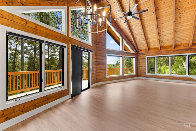 unfurnished sunroom featuring vaulted ceiling with beams, a chandelier, and wooden ceiling