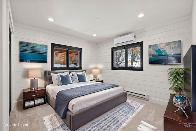 carpeted bedroom featuring a baseboard heating unit, wooden walls, and a wall unit AC