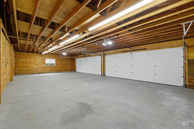 garage with wood walls