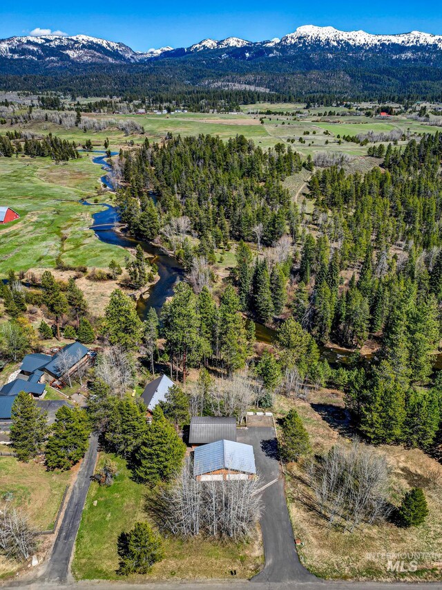 drone / aerial view featuring a mountain view