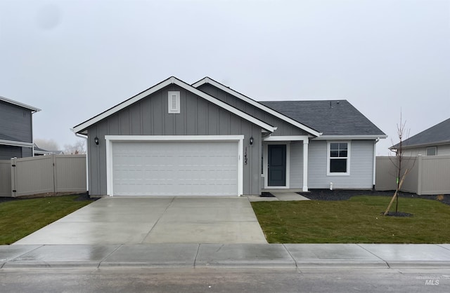 11478 W Julianna Ct, Nampa, ID 83651 - ranch-style home featuring concrete driveway, an attached garage, board and batten siding, a gate, and a shingled roof