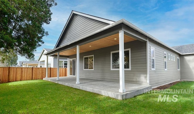 2386 N Ice Fire Ave, Star, ID 83669 - rear view of house with a patio area