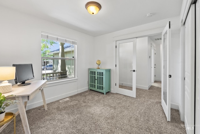 office area with french doors, carpet floors, and baseboards