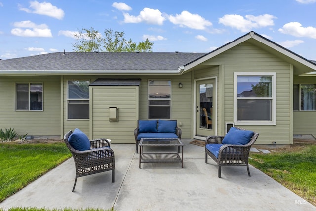 back of house featuring an outdoor hangout area and a patio