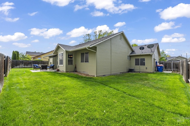 back of house featuring a patio and cooling unit