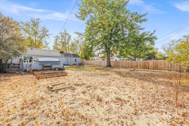 view of yard featuring fence