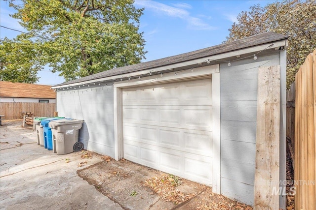 garage with fence