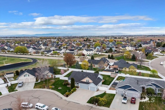 birds eye view of property with a residential view