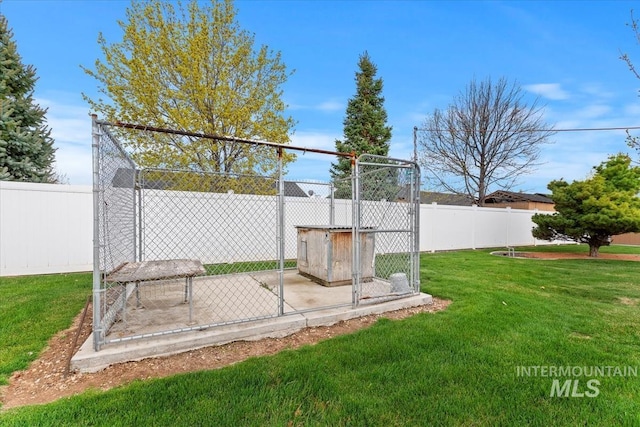 view of yard with a fenced backyard