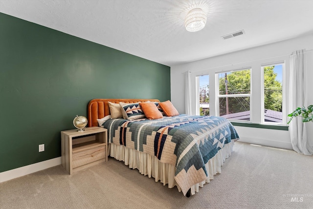 918 N 31st St, Boise, ID 83702 - bedroom with light carpet and baseboards