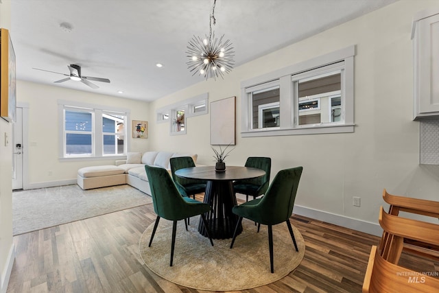 918 N 31st St, Boise, ID 83702 - dining area with wood finished floors, a chandelier, a ceiling fan, and recessed lighting