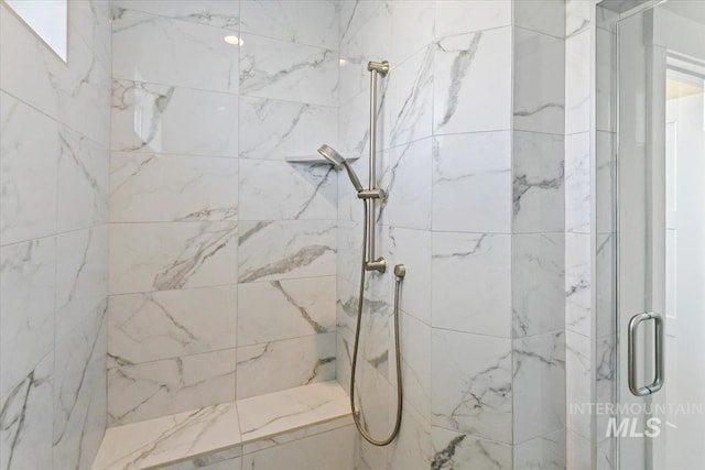13958 Levendi Ct, Caldwell, ID 83607 - full bathroom featuring a marble finish shower