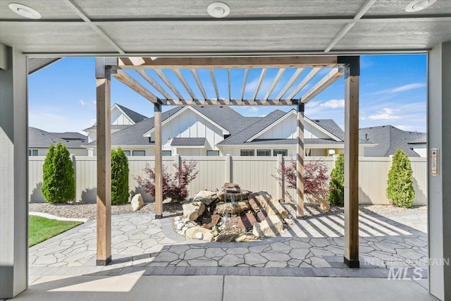 13958 Levendi Ct, Caldwell, ID 83607 - fenced backyard with a pergola, a patio area, and a residential view