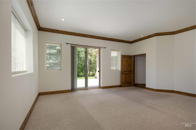 205 Shaun Ln, Hailey, ID 83333 - empty room featuring baseboards, light carpet, ornamental molding, and recessed lighting