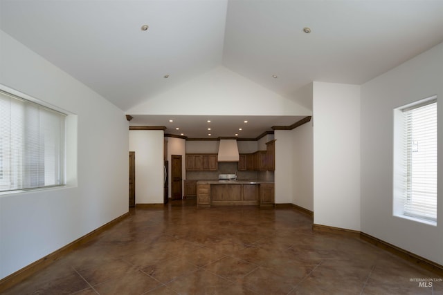205 Shaun Ln, Hailey, ID 83333 - unfurnished living room with vaulted ceiling, baseboards, and recessed lighting