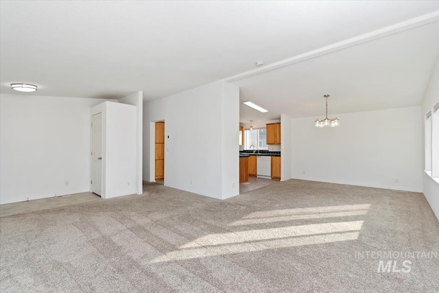 1404 River Run Ln, Caldwell, ID 83605 - unfurnished living room with a chandelier and light carpet