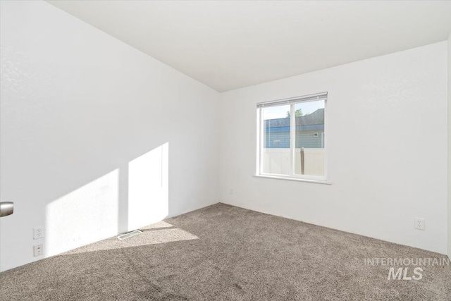 1404 River Run Ln, Caldwell, ID 83605 - carpeted empty room with lofted ceiling