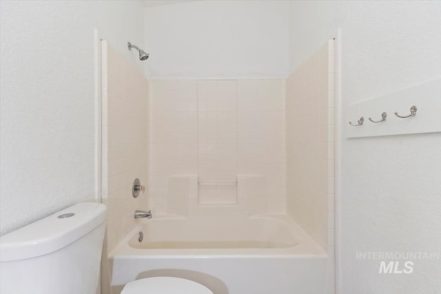 1404 River Run Ln, Caldwell, ID 83605 - bathroom featuring shower / bathtub combination and a textured wall