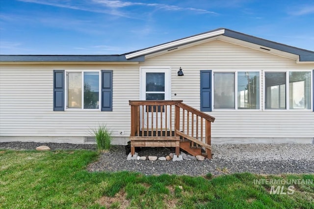 1404 River Run Ln, Caldwell, ID 83605 - rear view of house with crawl space
