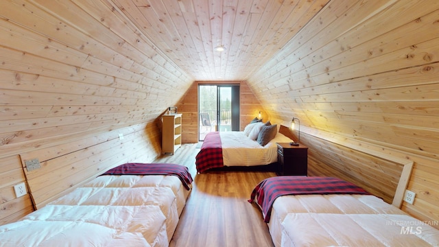 85 Cottage Rd, Anatone, WA 99401 - bedroom with wood walls, wood ceiling, wood finished floors, and vaulted ceiling