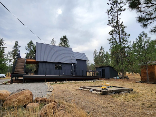 85 Cottage Rd, Anatone, WA 99401 - back of house featuring a deck and metal roof