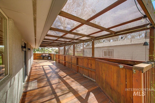 wooden deck featuring visible vents