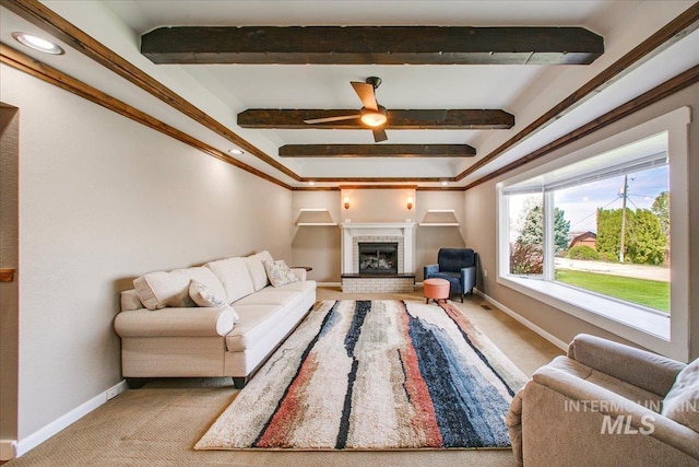 carpeted living room featuring a ceiling fan, a fireplace, baseboards, beam ceiling, and recessed lighting