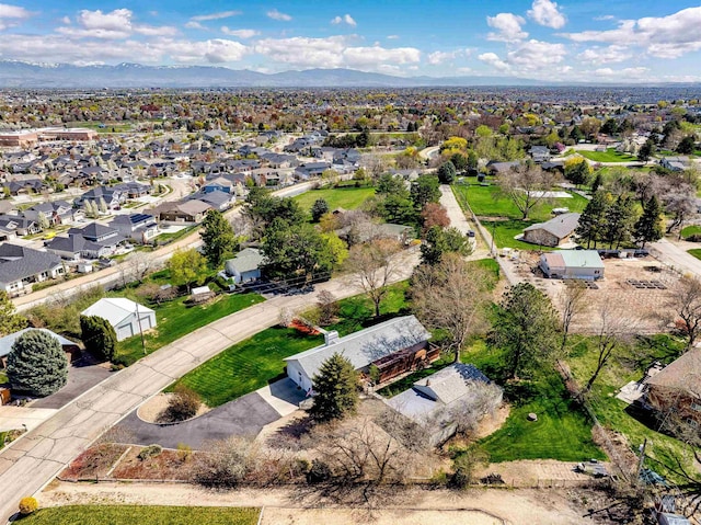 drone / aerial view featuring a mountain view and a residential view