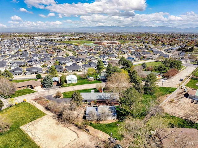 bird's eye view featuring a mountain view and a residential view