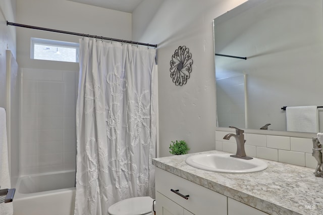 full bathroom with shower / bath combination with curtain, toilet, vanity, and tasteful backsplash