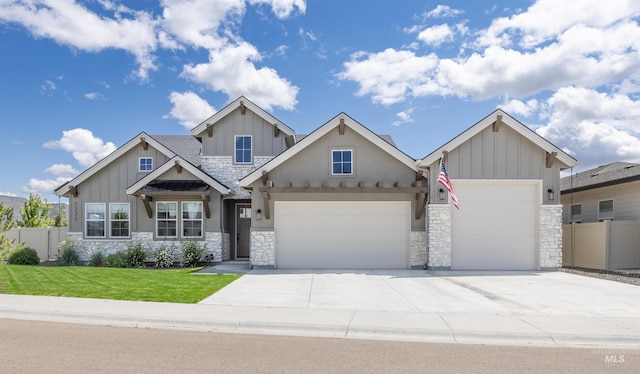 5222 S Montague Way, Meridian, ID 83642 - craftsman house featuring stone siding, board and batten siding, an attached garage, and concrete driveway