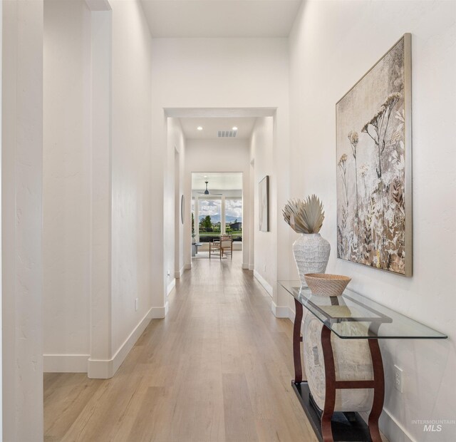 5222 S Montague Way, Meridian, ID 83642 - hallway with light wood-style floors and baseboards