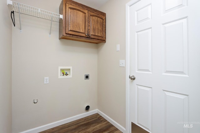 laundry room with cabinet space, baseboards, dark wood-type flooring, hookup for an electric dryer, and washer hookup