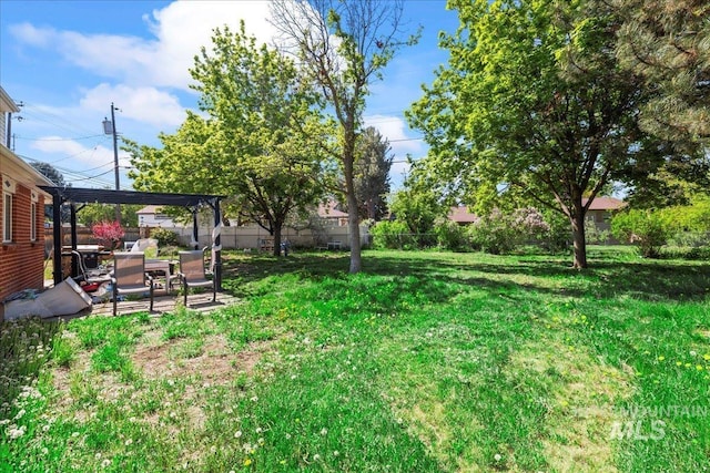 view of yard featuring a fenced backyard and a patio area