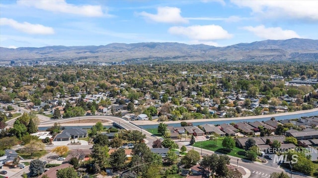 drone / aerial view featuring a mountain view and a residential view