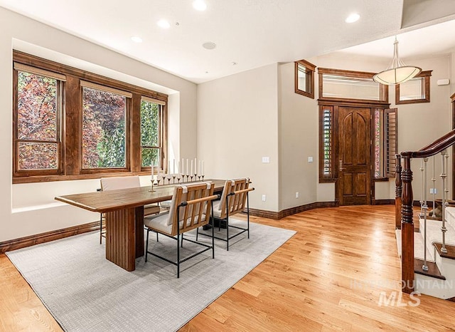 1452 S Hidden Island Pl, Eagle, ID 83616 - dining space featuring stairway, light wood-type flooring, and recessed lighting