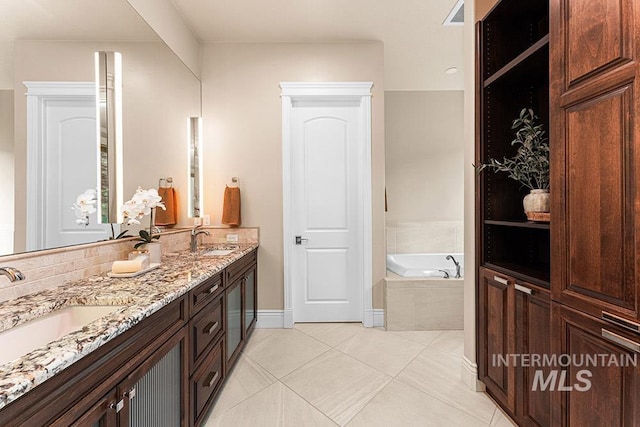 1452 S Hidden Island Pl, Eagle, ID 83616 - bathroom with double vanity, a garden tub, and tile patterned floors