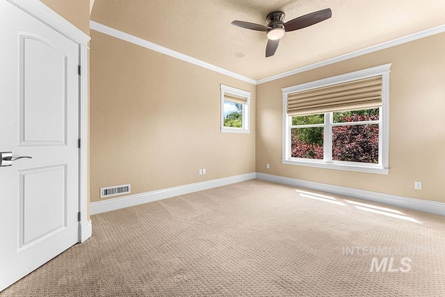 1452 S Hidden Island Pl, Eagle, ID 83616 - unfurnished room with light carpet, ornamental molding, and ceiling fan