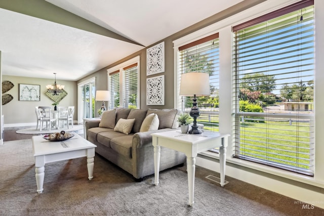 810 N Eagle Hills Way, Eagle, ID 83616 - carpeted living room featuring a chandelier and vaulted ceiling