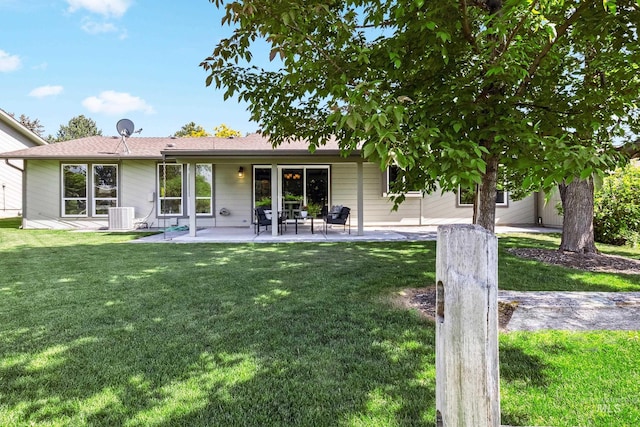 810 N Eagle Hills Way, Eagle, ID 83616 - rear view of house with central air condition unit, a yard, and a patio area