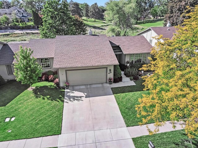810 N Eagle Hills Way, Eagle, ID 83616 - view of front of property featuring a shingled roof, driveway, a front lawn, and a garage