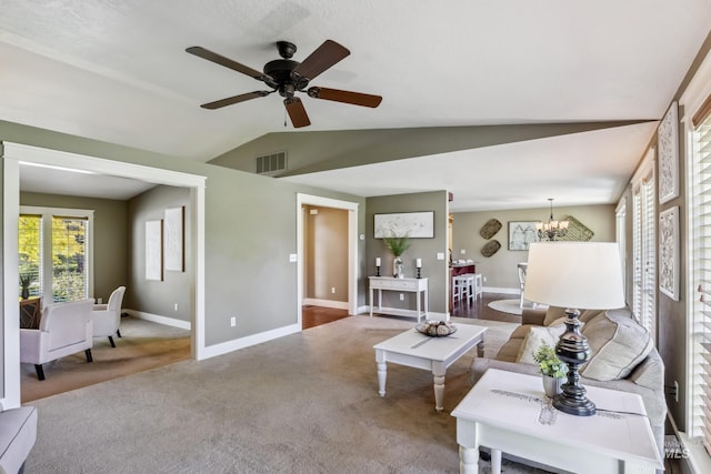 810 N Eagle Hills Way, Eagle, ID 83616 - living area with vaulted ceiling, carpet flooring, a chandelier, ceiling fan, and baseboards