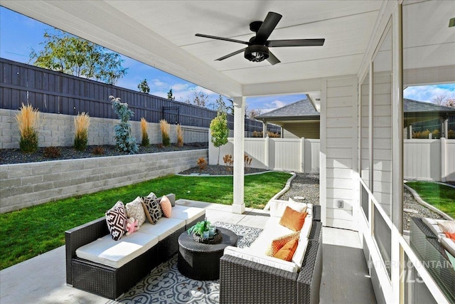 view of patio featuring outdoor lounge area and ceiling fan