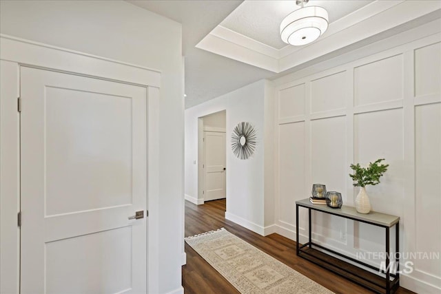 hall featuring dark wood-type flooring