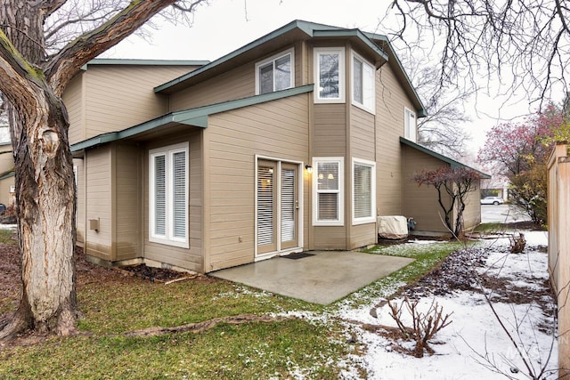 rear view of property with a patio area