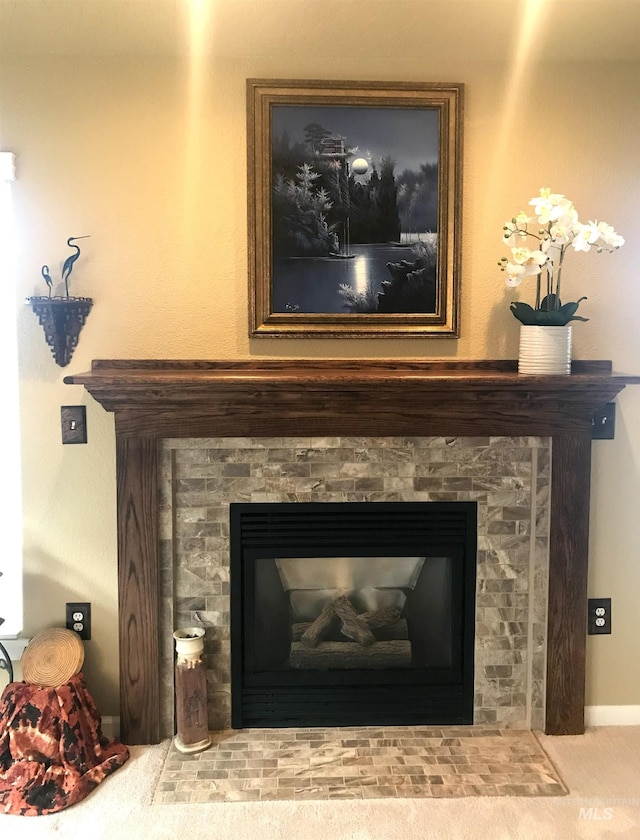 details featuring a fireplace with flush hearth