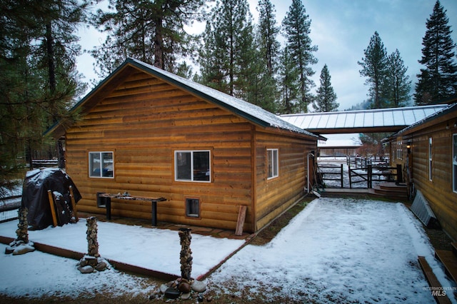 view of snow covered property