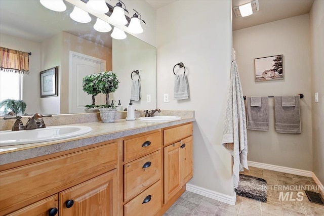 bathroom featuring vanity